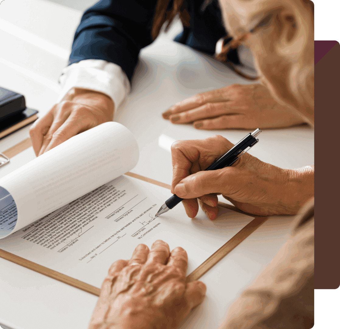 Signing a contract with a pen.